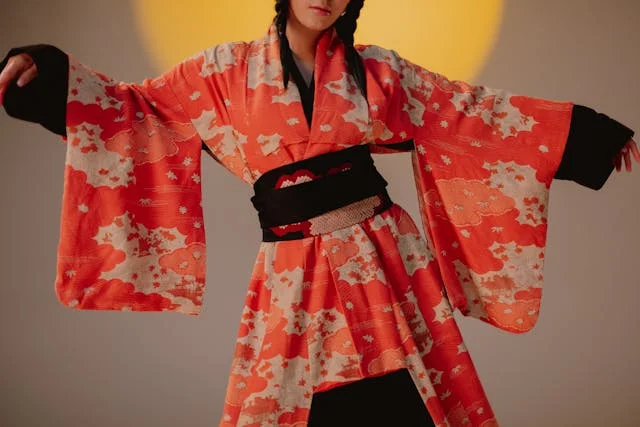 Young woman wearing traditional Japanese furisode kimono with long swinging sleeves at Coming-of-Age ceremony